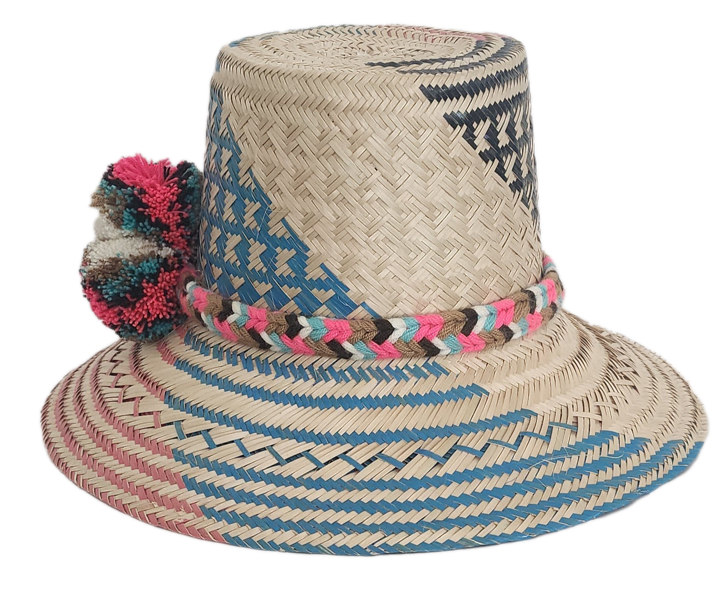 Colorful Wayuu straw hat featuring woven blue, pink, and natural patterns with a bright multicolor pom-pom band. A bold, handcrafted boho fashion piece.