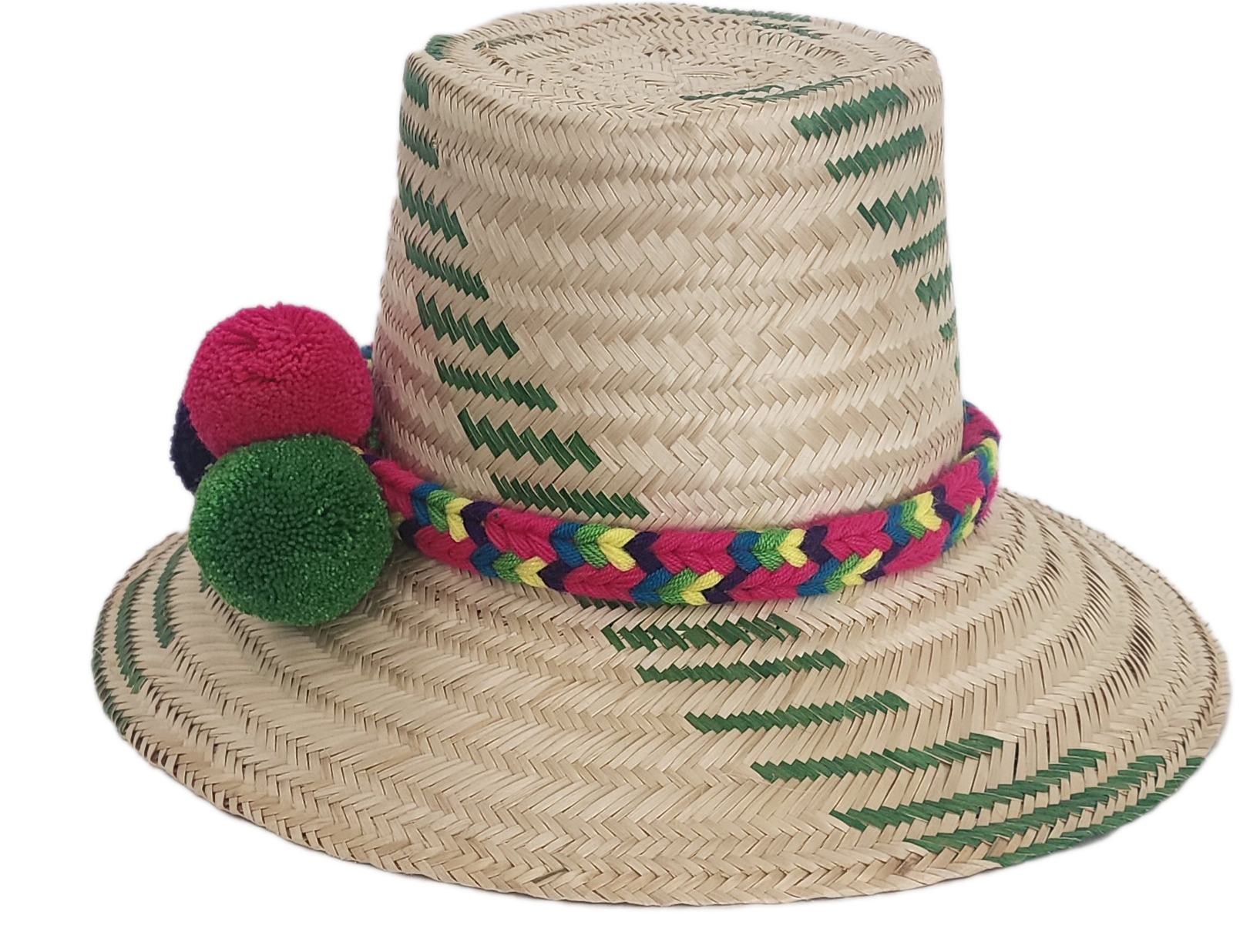Handwoven Wayuu straw hat with green chevron patterns and a vibrant braided band, finished with red, green, and purple pom-poms. A playful boho accessory.