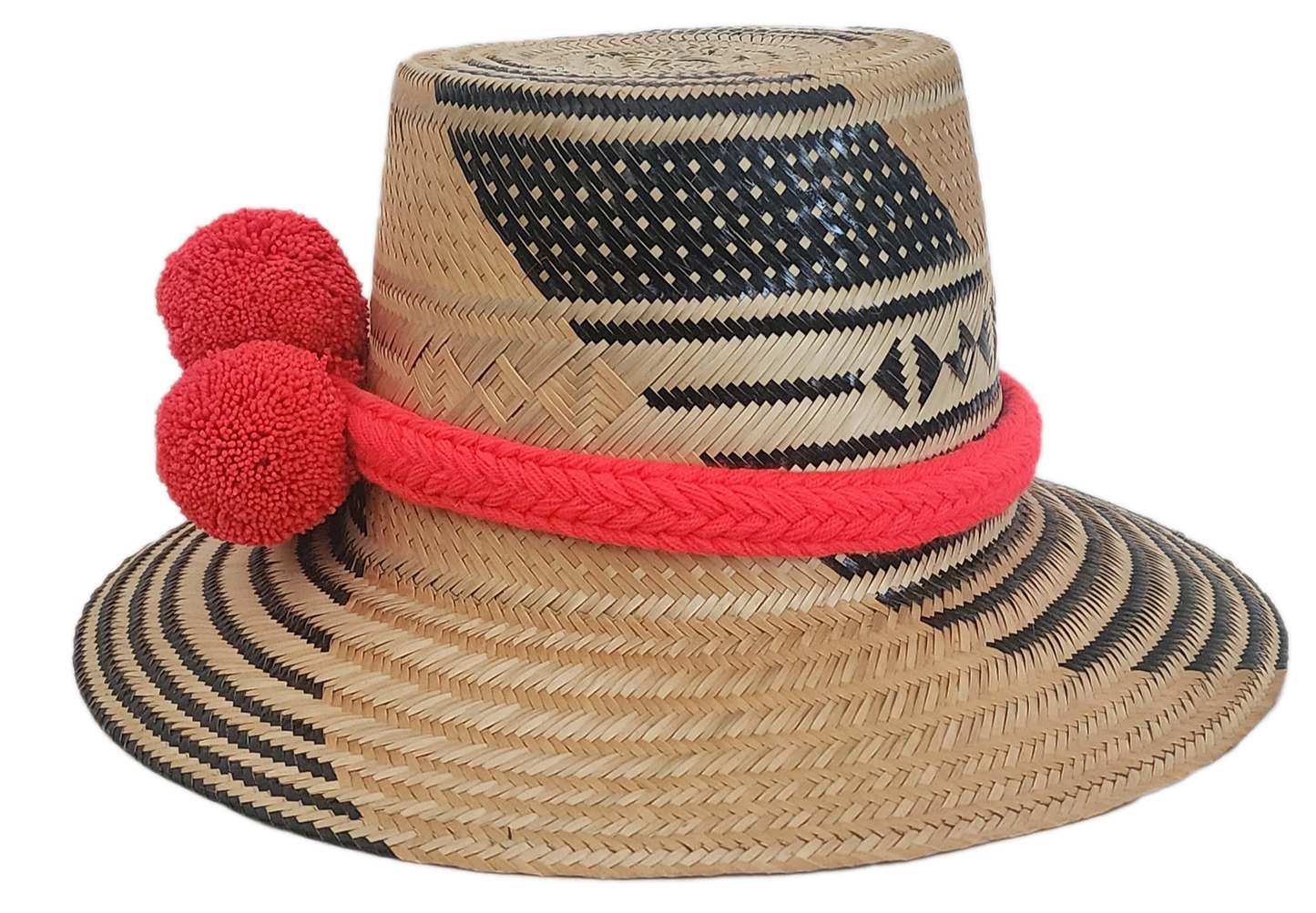 Handcrafted Wayuu hat with red braided band, pom-poms, and black ethnic weave on natural straw base.