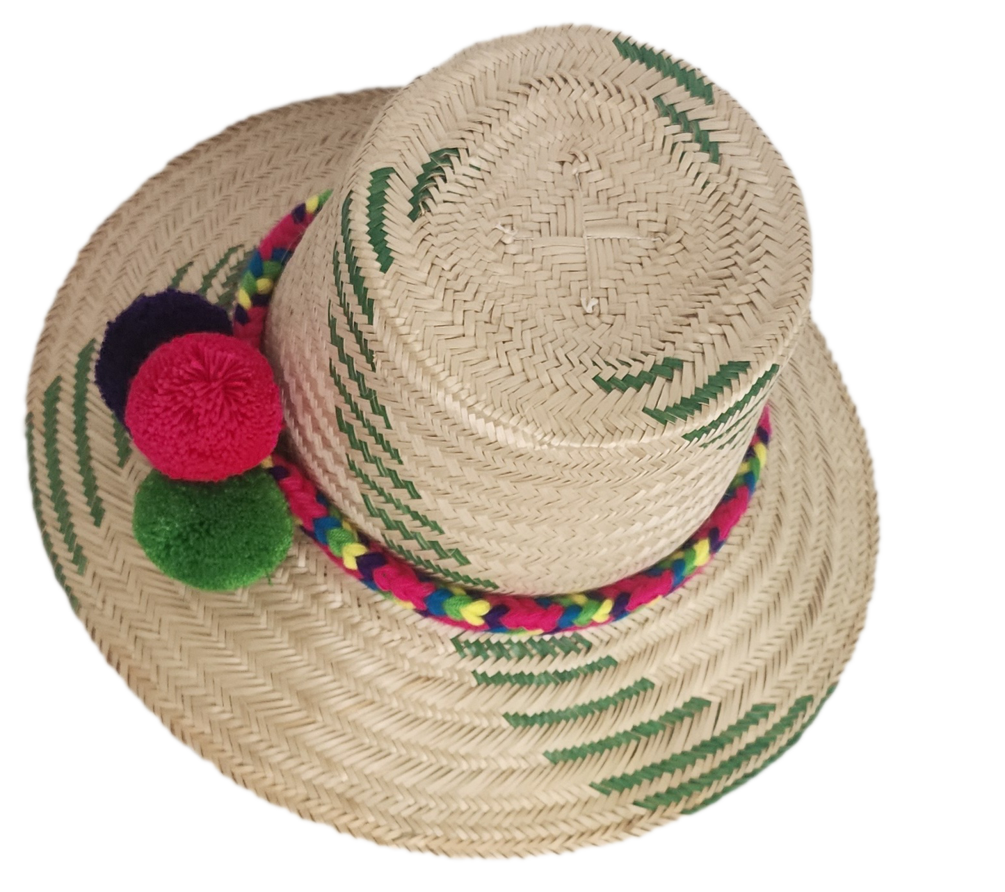 Handwoven Wayuu straw hat with green chevron patterns and a vibrant braided band, finished with red, green, and purple pom-poms. A playful boho accessory.
