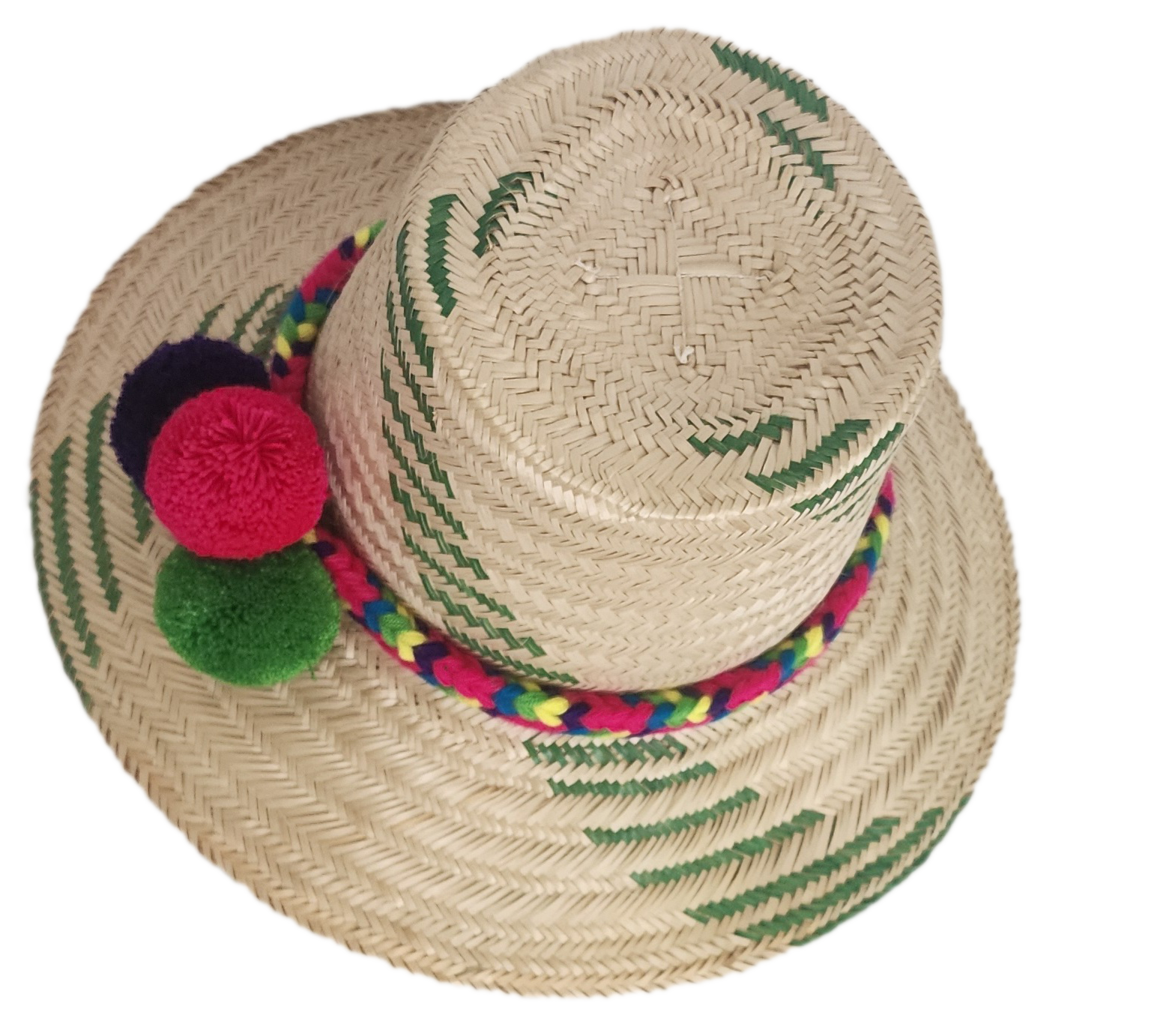 Handwoven Wayuu straw hat with green chevron patterns and a vibrant braided band, finished with red, green, and purple pom-poms. A playful boho accessory.