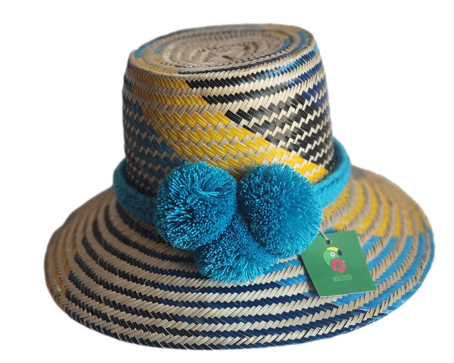 "Handmade colorful Wayuu hat from Iraca palm fibers with decorative pompoms, crafted by Colombian and Venezuelan artisans."