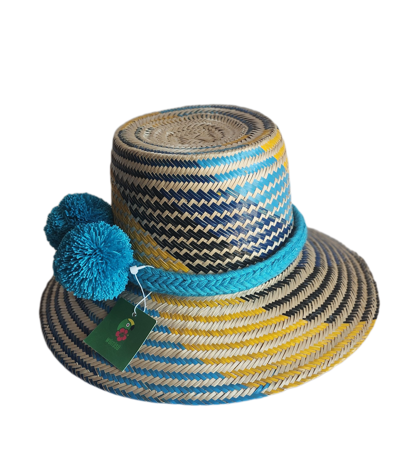 "Handmade colorful Wayuu hat from Iraca palm fibers with decorative pompoms, crafted by Colombian and Venezuelan artisans."
