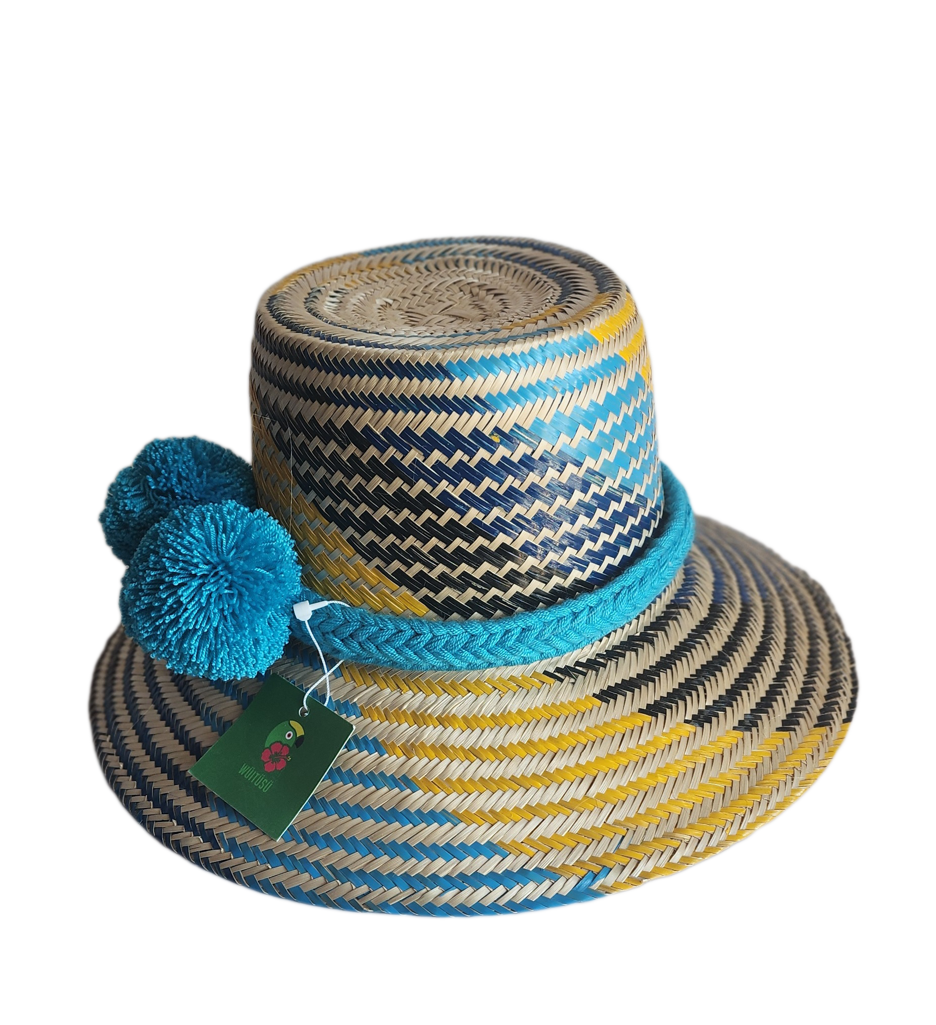 "Handmade colorful Wayuu hat from Iraca palm fibers with decorative pompoms, crafted by Colombian and Venezuelan artisans."