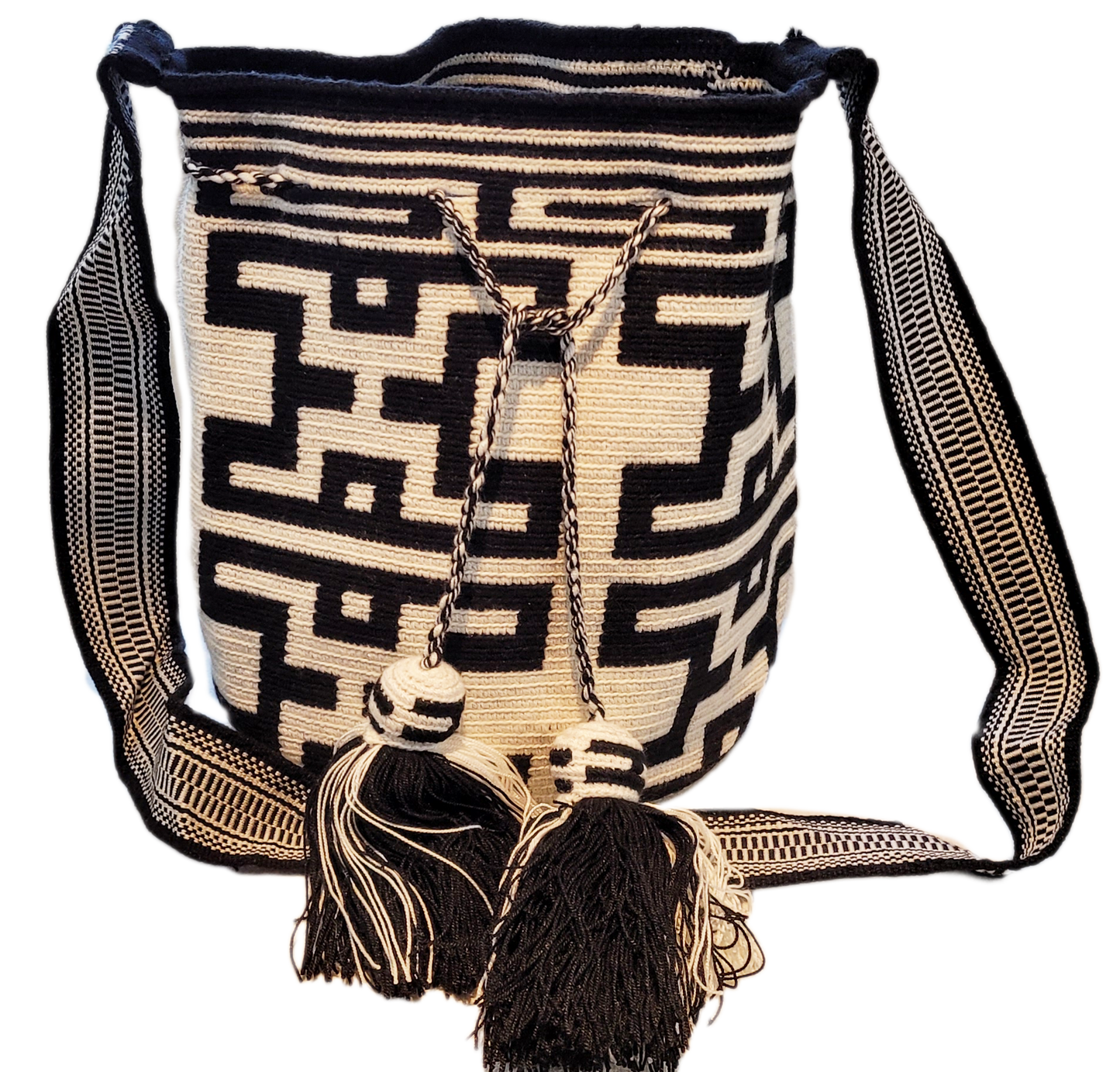 "Handmade Paleteada Crochet Wayuu Bag, colorful and bohemian, crafted by Wayuu artisans, supporting sustainable livelihoods."