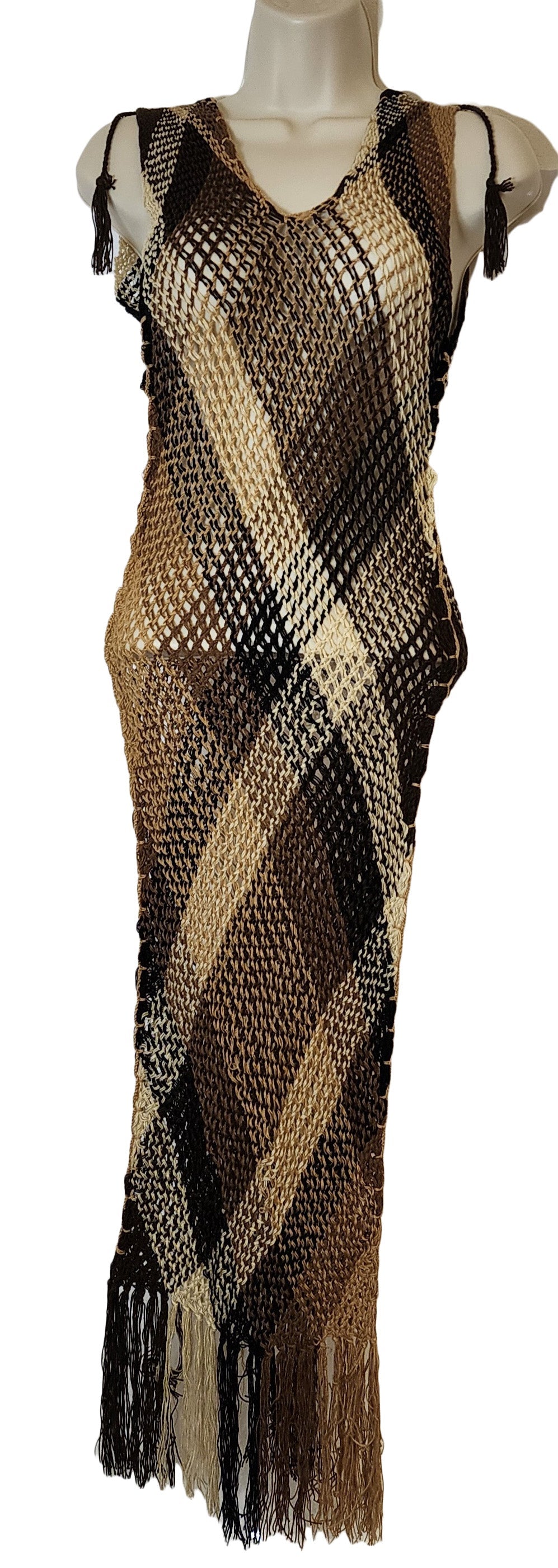 "Handmade Wayuu Crochet Coverup, colorful and intricately patterned, perfect as a beach or casual wear overlay."