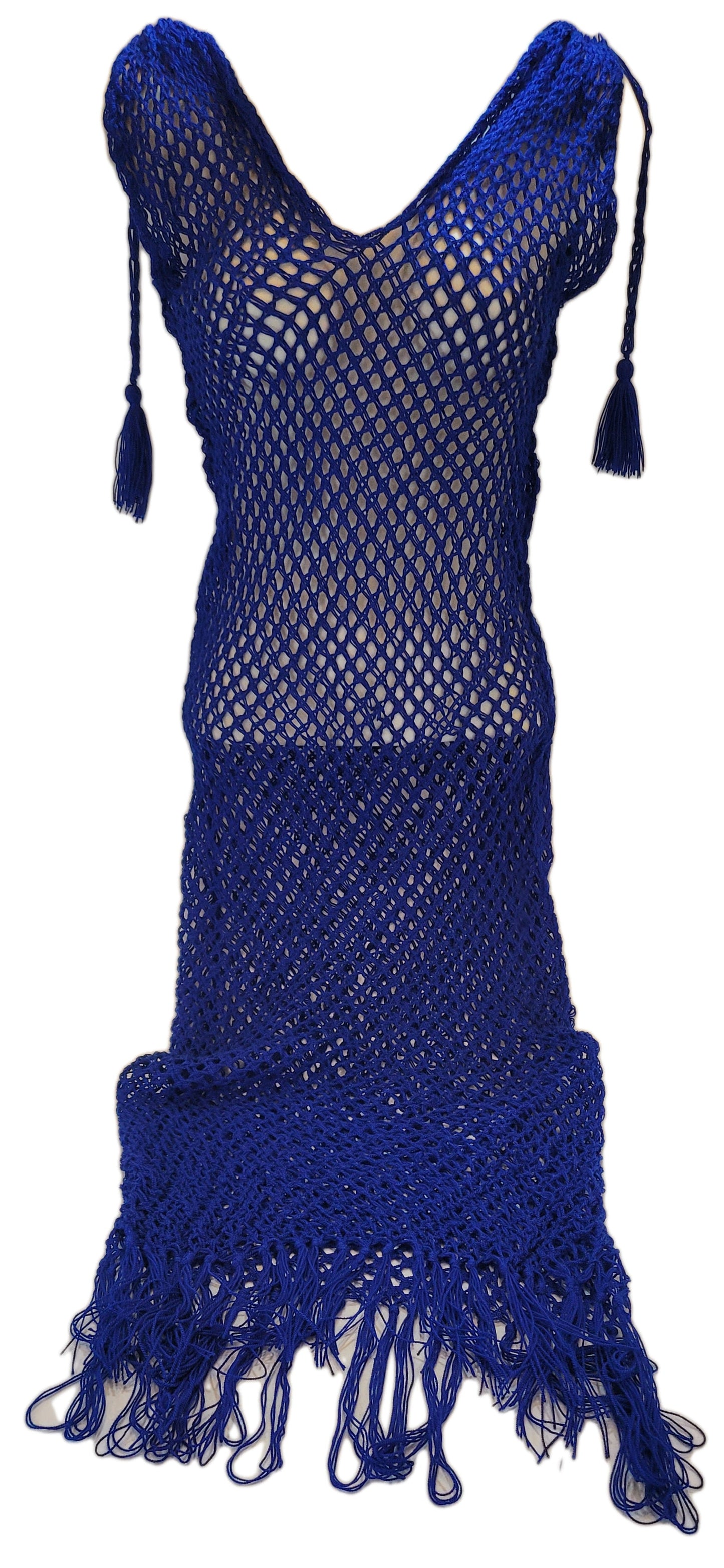 "Handmade Wayuu crochet coverup with intricate patterns, crafted by artisans, offering a loose, breathable fit for warm clima