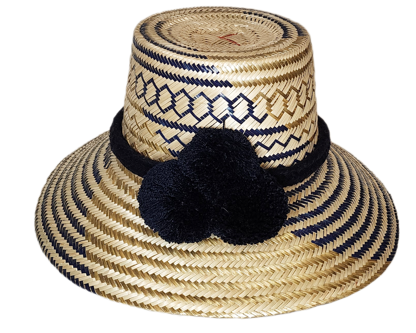 "Handmade Wayuu hat crafted from Iraca palm, adorned with colorful pompoms, adjustable for various head sizes."