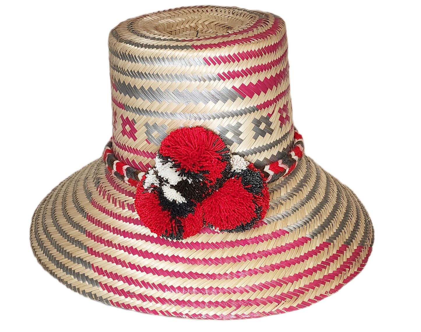 "Handmade Wayuu hat crafted from Iraca palm fibers by Wuitusu artisans, adorned with colorful pompoms for cultural significan