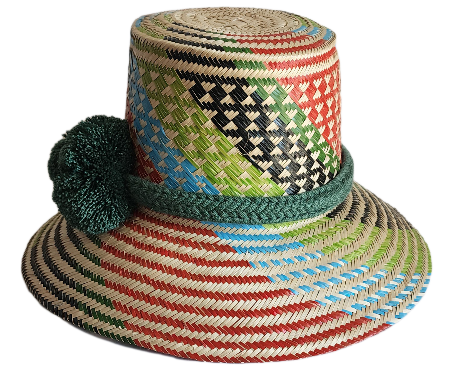 "Handmade Wayuu hat crafted from vibrant Iraca palm fibers, adorned with culturally significant pompoms for sun protection an