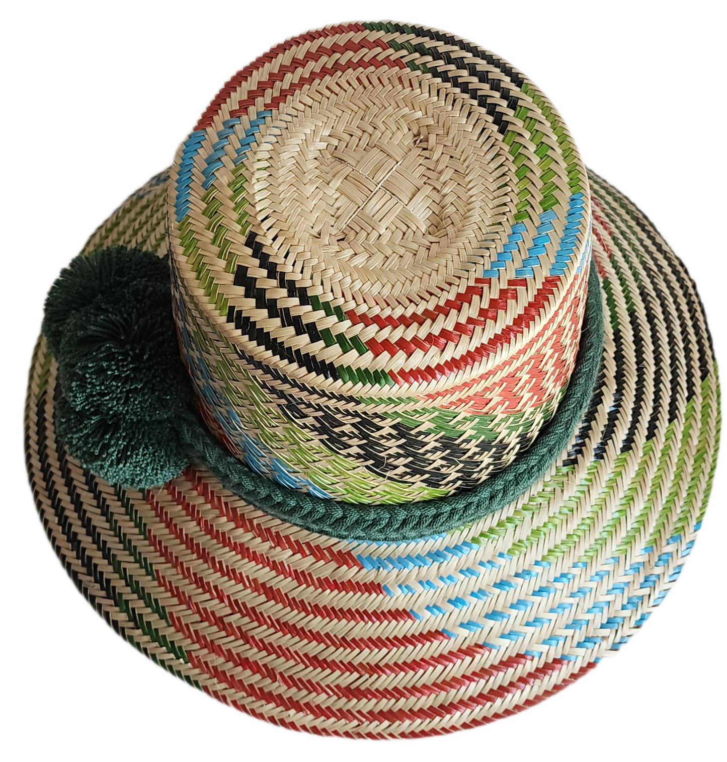 "Handmade Wayuu hat crafted from vibrant Iraca palm fibers, adorned with culturally significant pompoms for sun protection an