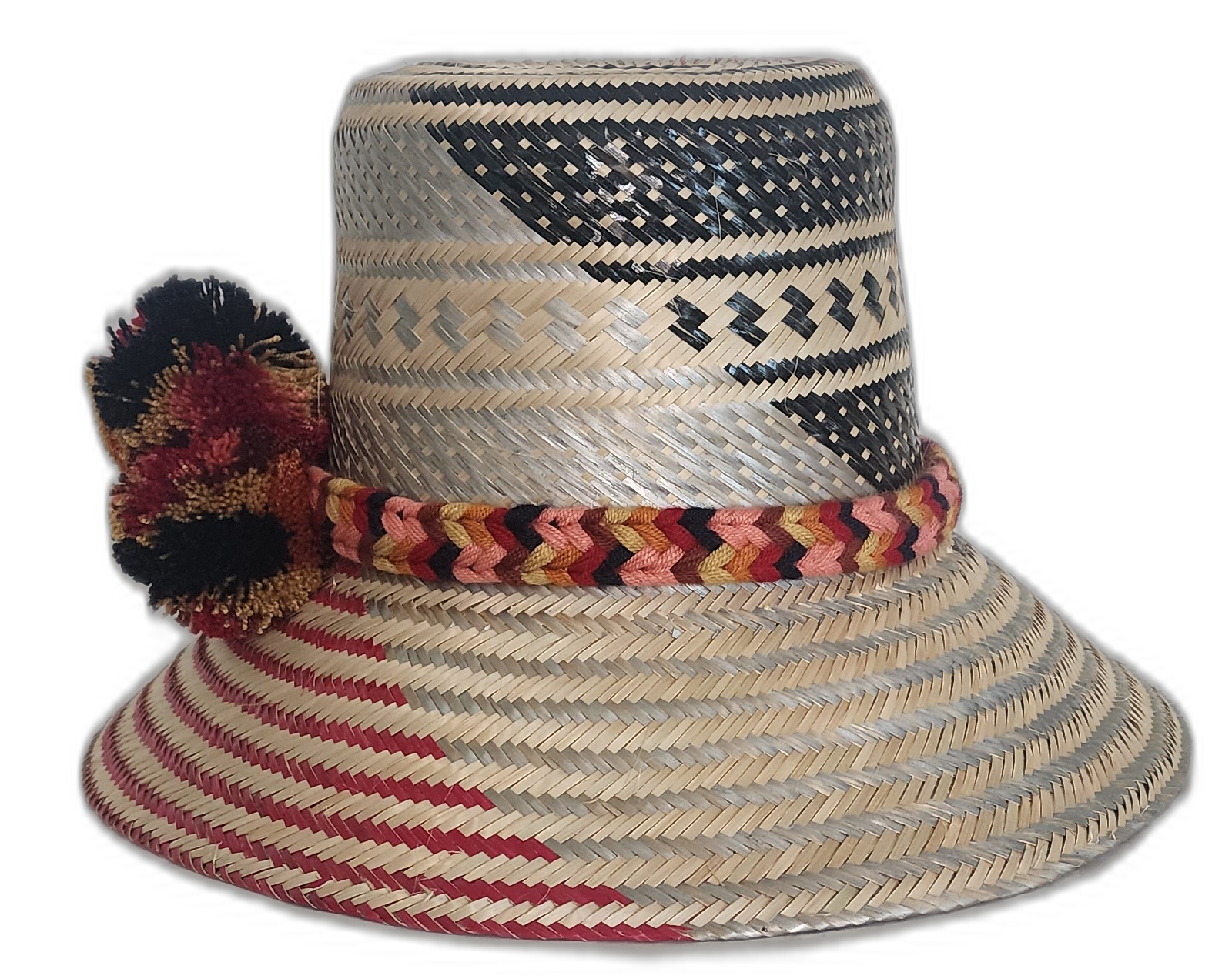 Wayuu artisan straw hat with red and black weave and multicolor pompoms