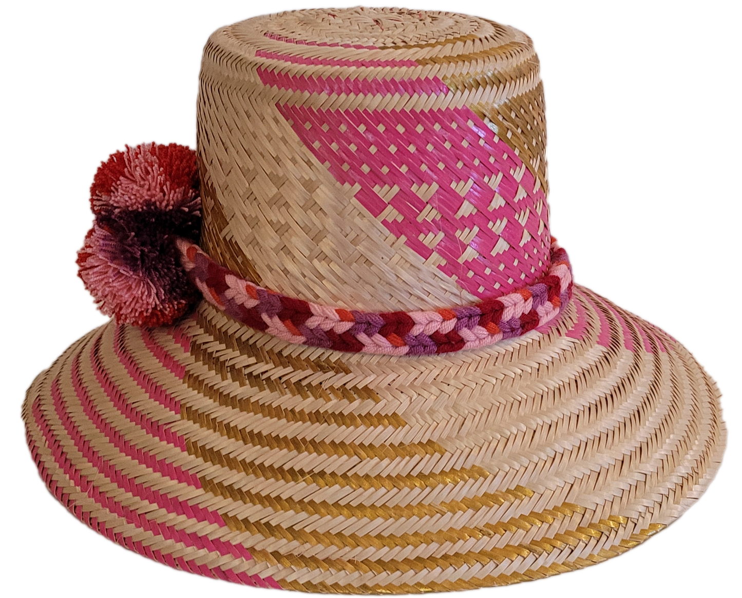 Boho Chick straw hat featuring pink weave and purple-red pompoms.