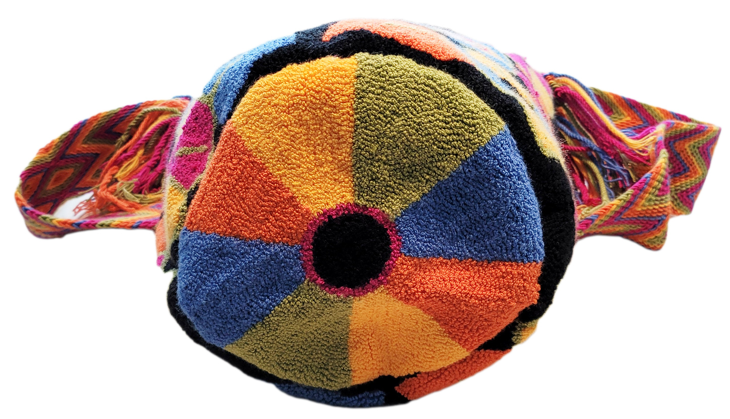 "Handmade Wuitusu Wayuu Bag with vibrant, geometric patterns, adjustable straps, and spacious interior, showcasing Wayuu arti