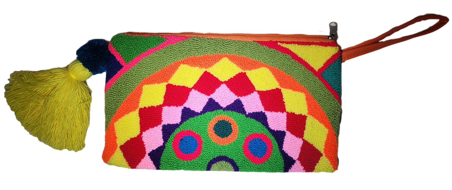 "Handmade Wuitusu Wayuu Needle Punch Clutch featuring vibrant, unique patterns by Wayuu artisans, zippered closure, and soft