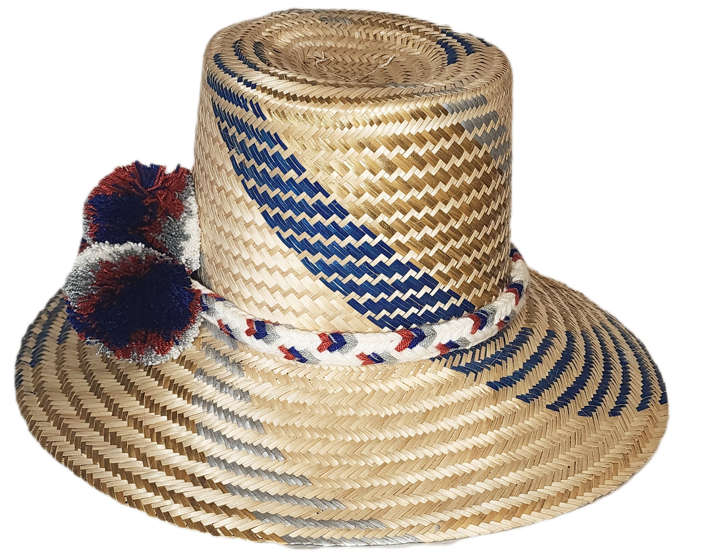 "Handwoven Wayuu hat made from Iraca palm fibers, adorned with colorful pompoms, showcasing artisan craftsmanship and cultura