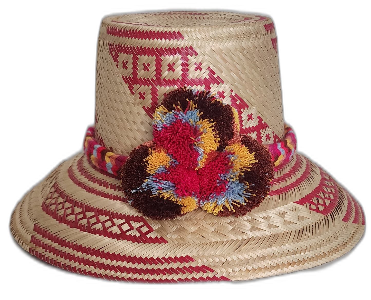Handmade Wayuu straw hat with red patterns and vibrant pompoms