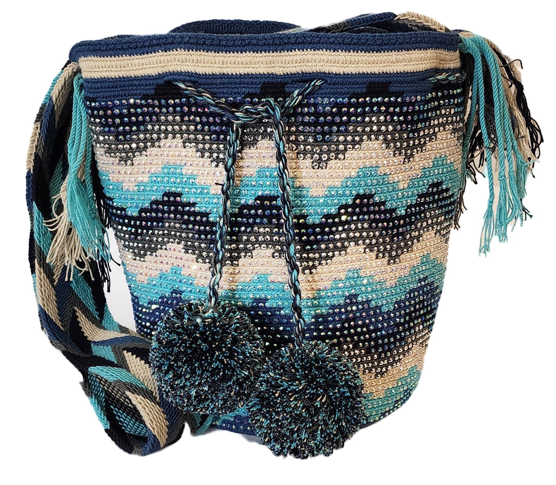Boho chick bag featuring large pom-poms, crystal details, and artisan strap.