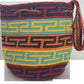 Image ALT text: "Colorful handmade crochet Wayuu bag showcasing boho and bohemian styles, crafted by Wayuu artisans from Colombia and Venezuela. Features vibrant, intricate crochet patterns typical of the Guajira Peninsula, adjustable handwoven straps, and designed for both style and functionality. Perfect for a beach day or adding a splash of color to everyday wear, supporting Fair Trade and Wayuu Taya Foundation."