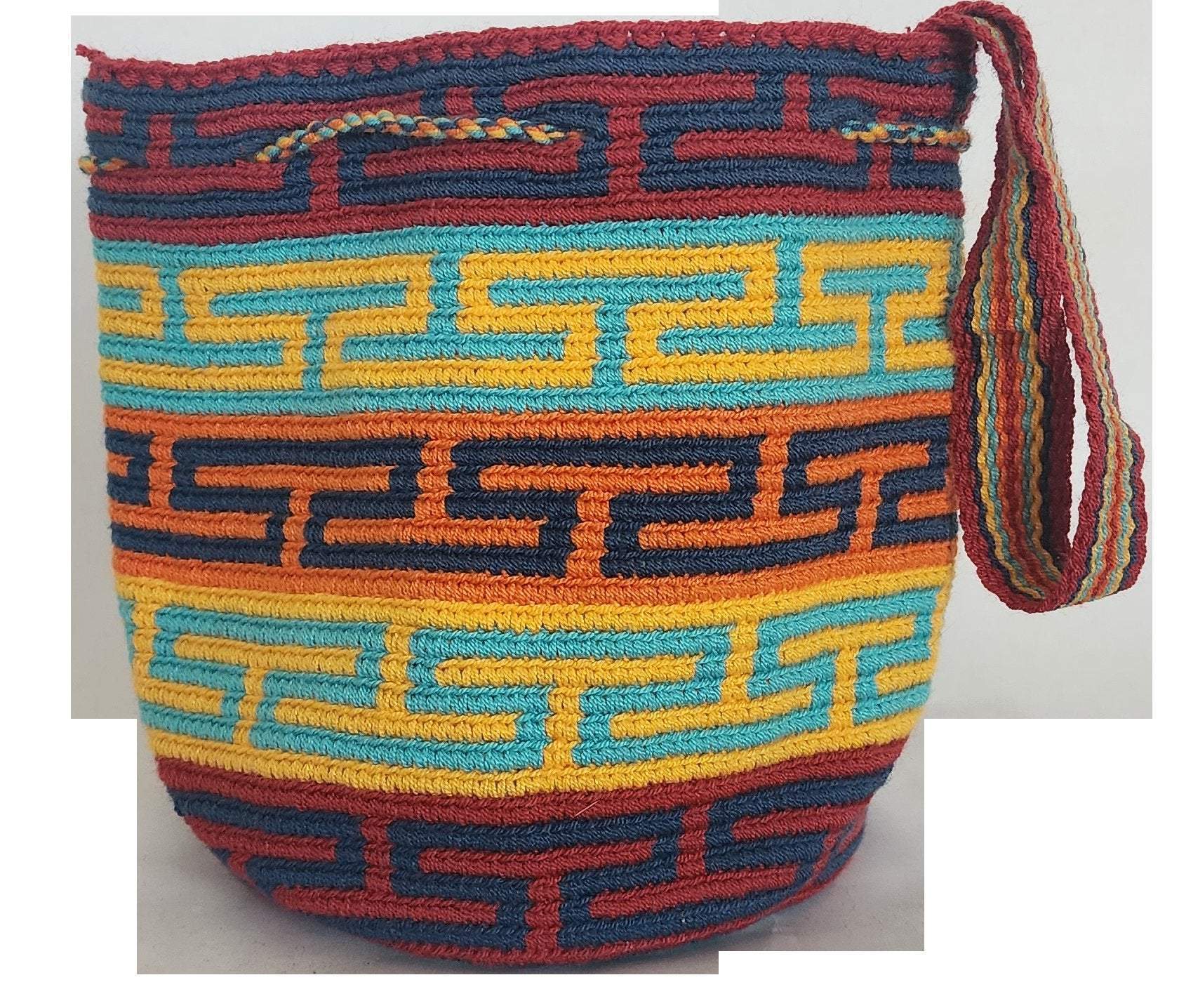 Bottom view Image ALT text: "Colorful handmade crochet Wayuu bag showcasing boho and bohemian styles, crafted by Wayuu artisans from Colombia and Venezuela. Features vibrant, intricate crochet patterns typical of the Guajira Peninsula, adjustable handwoven straps, and designed for both style and functionality. Perfect for a beach day or adding a splash of color to everyday wear, supporting Fair Trade and Wayuu Taya Foundation."