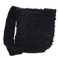 Elegant black Wayuu bag featuring handcrafted texture and rich detail.