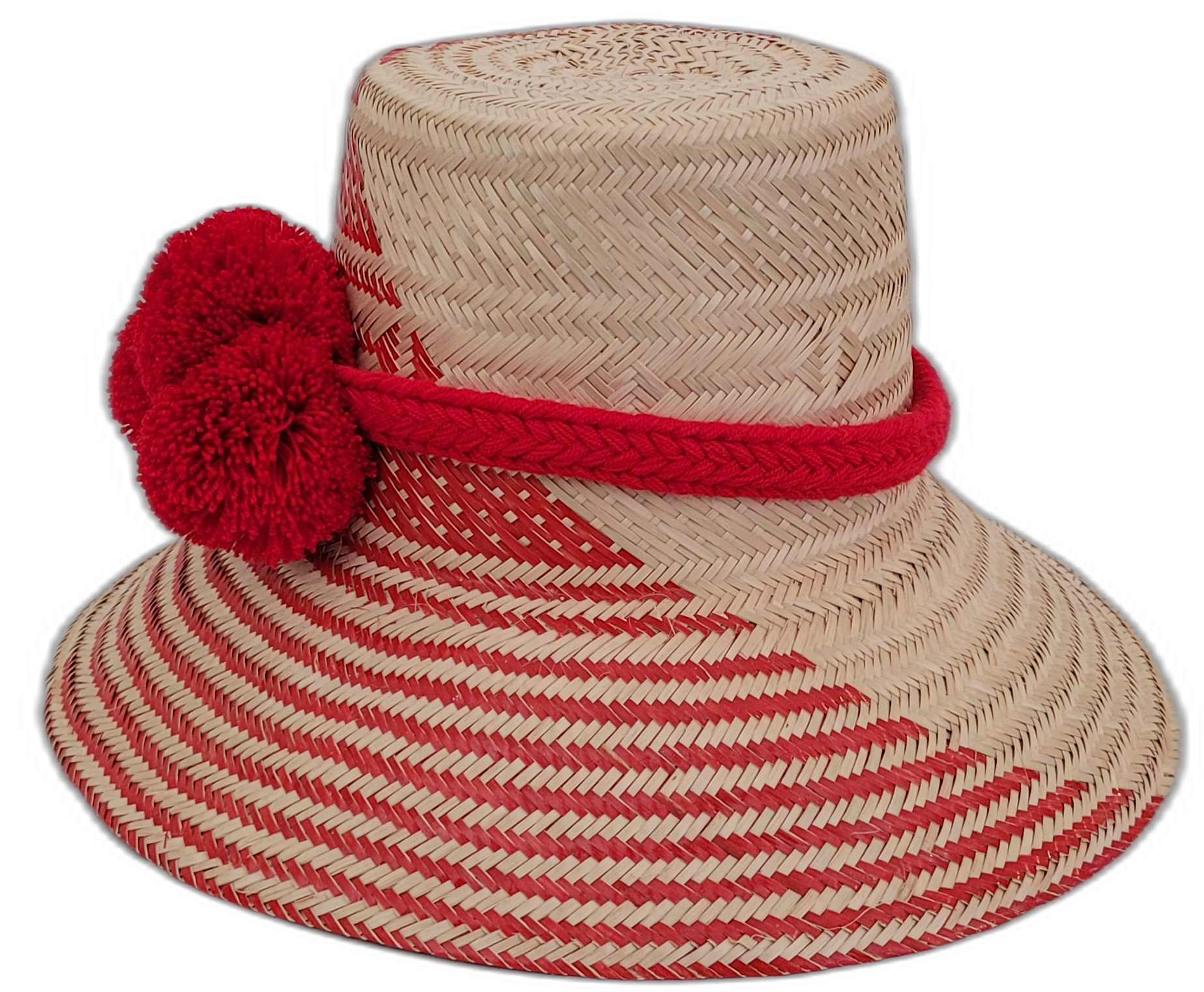 Artisan Wayuu hat Annabelle featuring natural palm base and vibrant red pompoms

