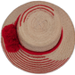 Annabelle boho straw hat with red palm fiber pattern and handcrafted pompom accents

