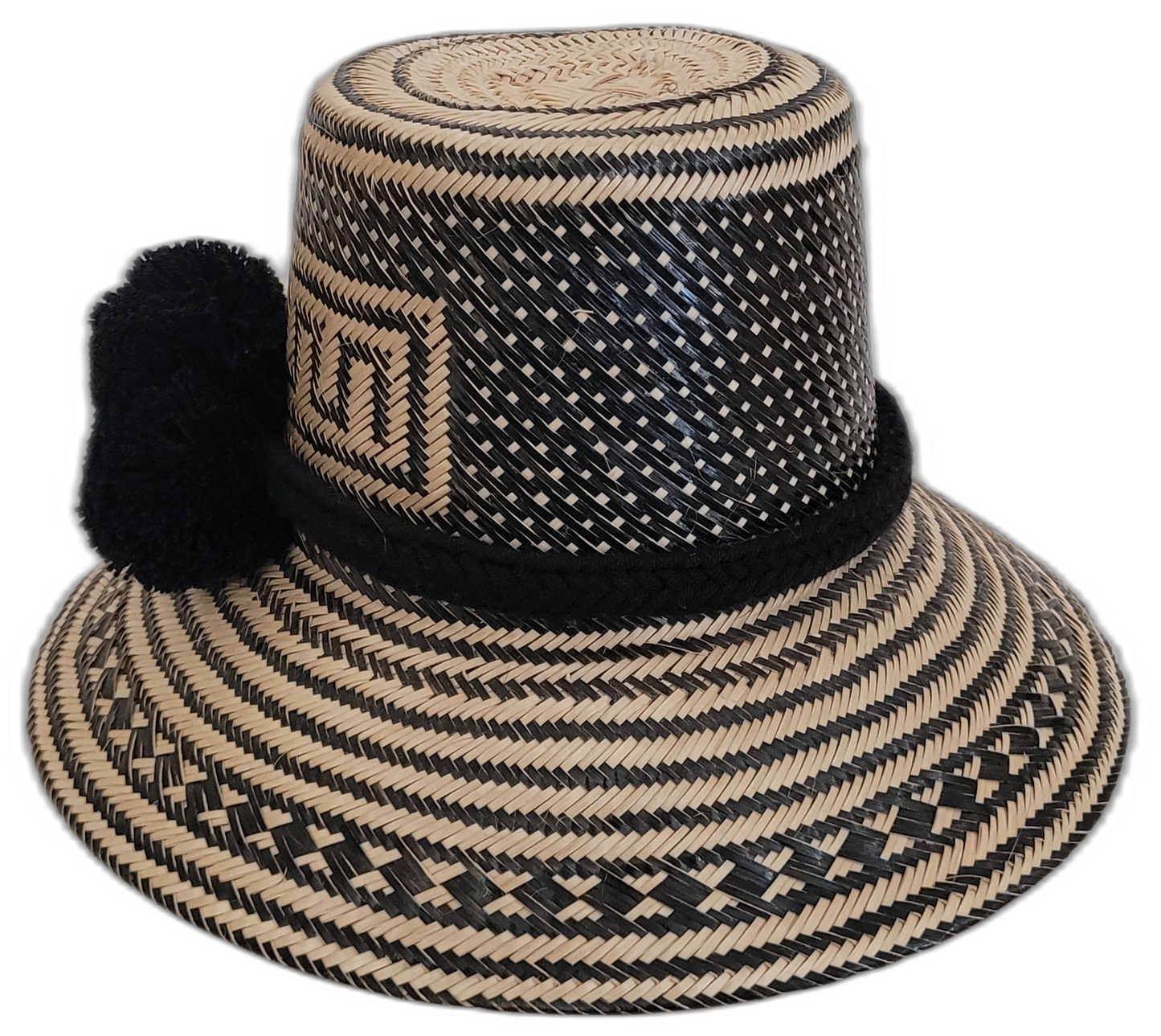 Artisan-crafted black Wayuu hat, black straw with elegant black pompoms.

