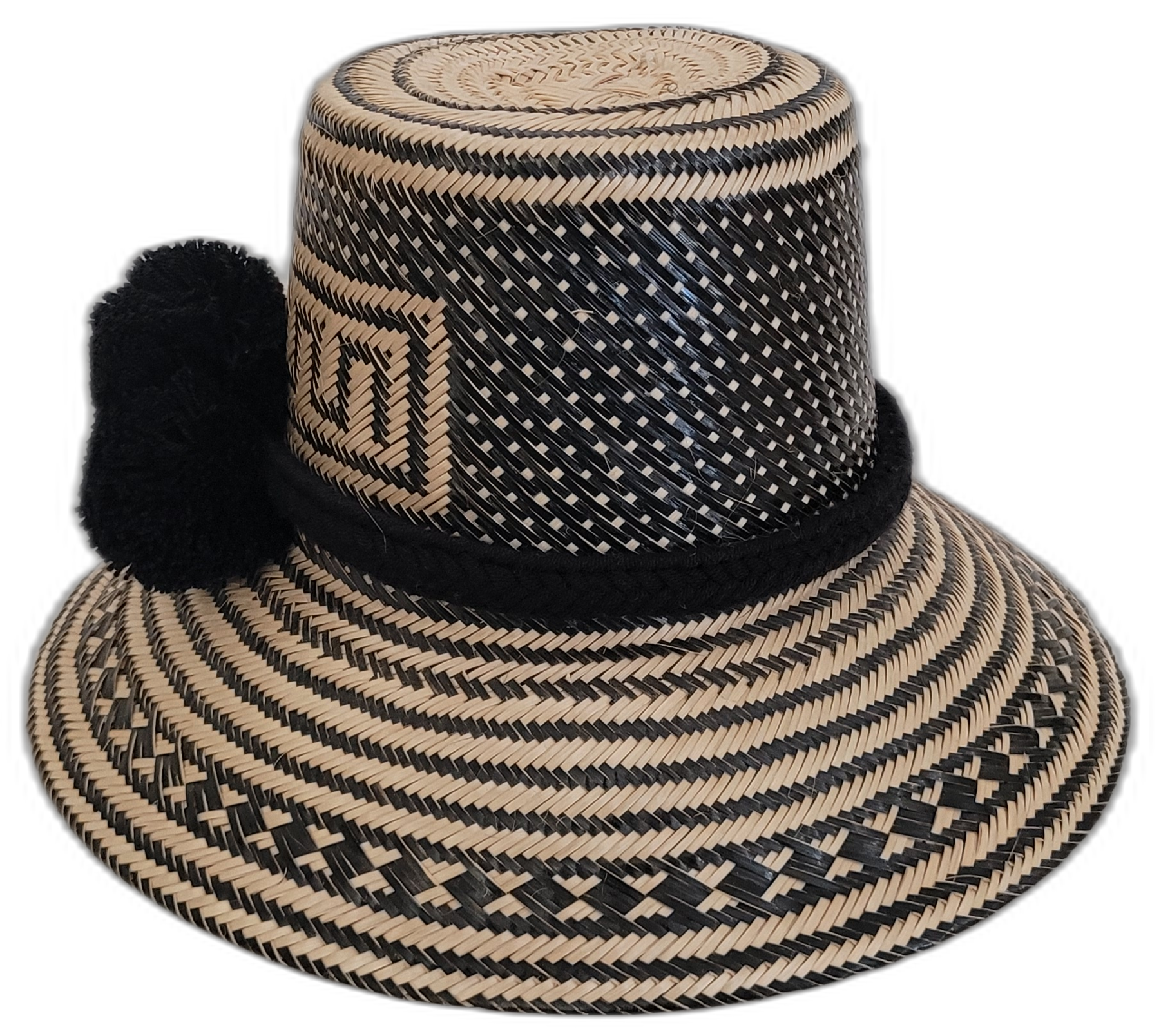 Artisan-crafted black Wayuu hat, black straw with elegant black pompoms.


