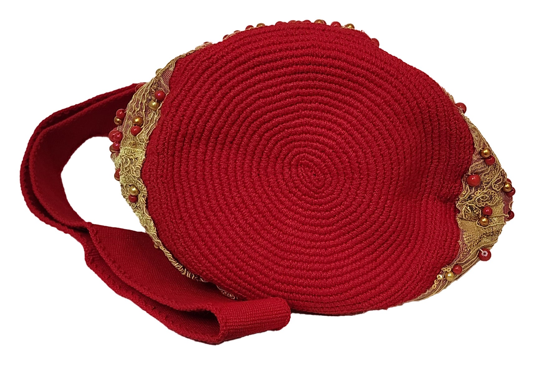 Embellished bohemian bag with bold colors, intricate embroidery, and beadwork.