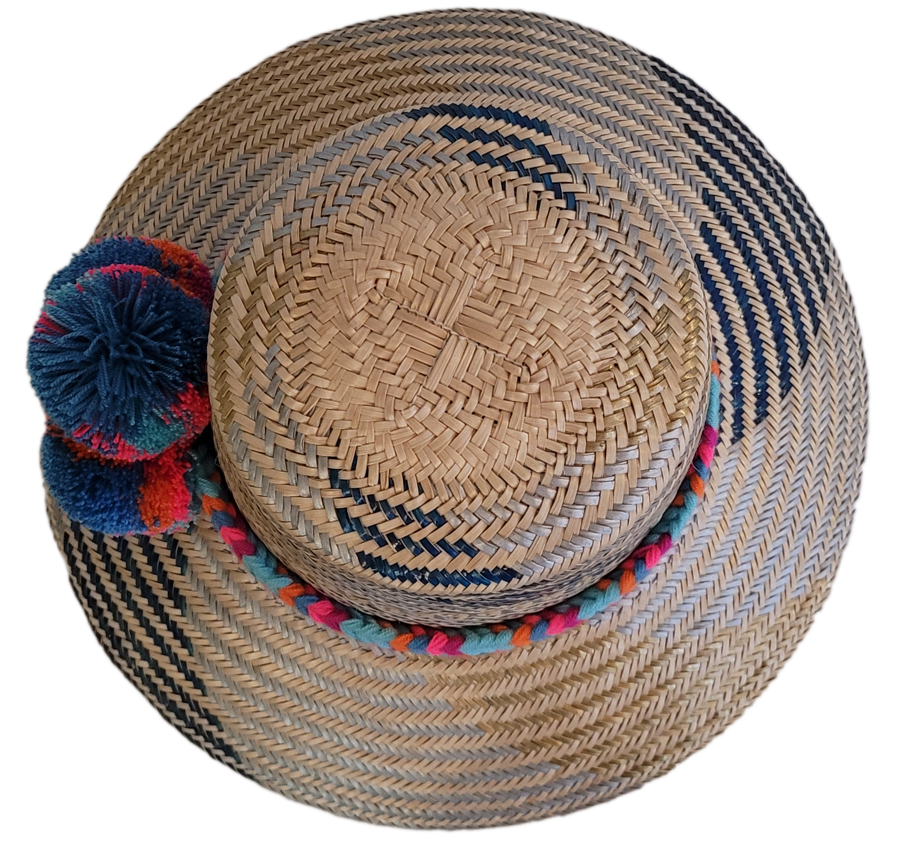 Bohemian handmade hat with colorful pompoms and natural weave.