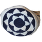 Bohemian handmade bag in white and navy with vibrant red tassels.