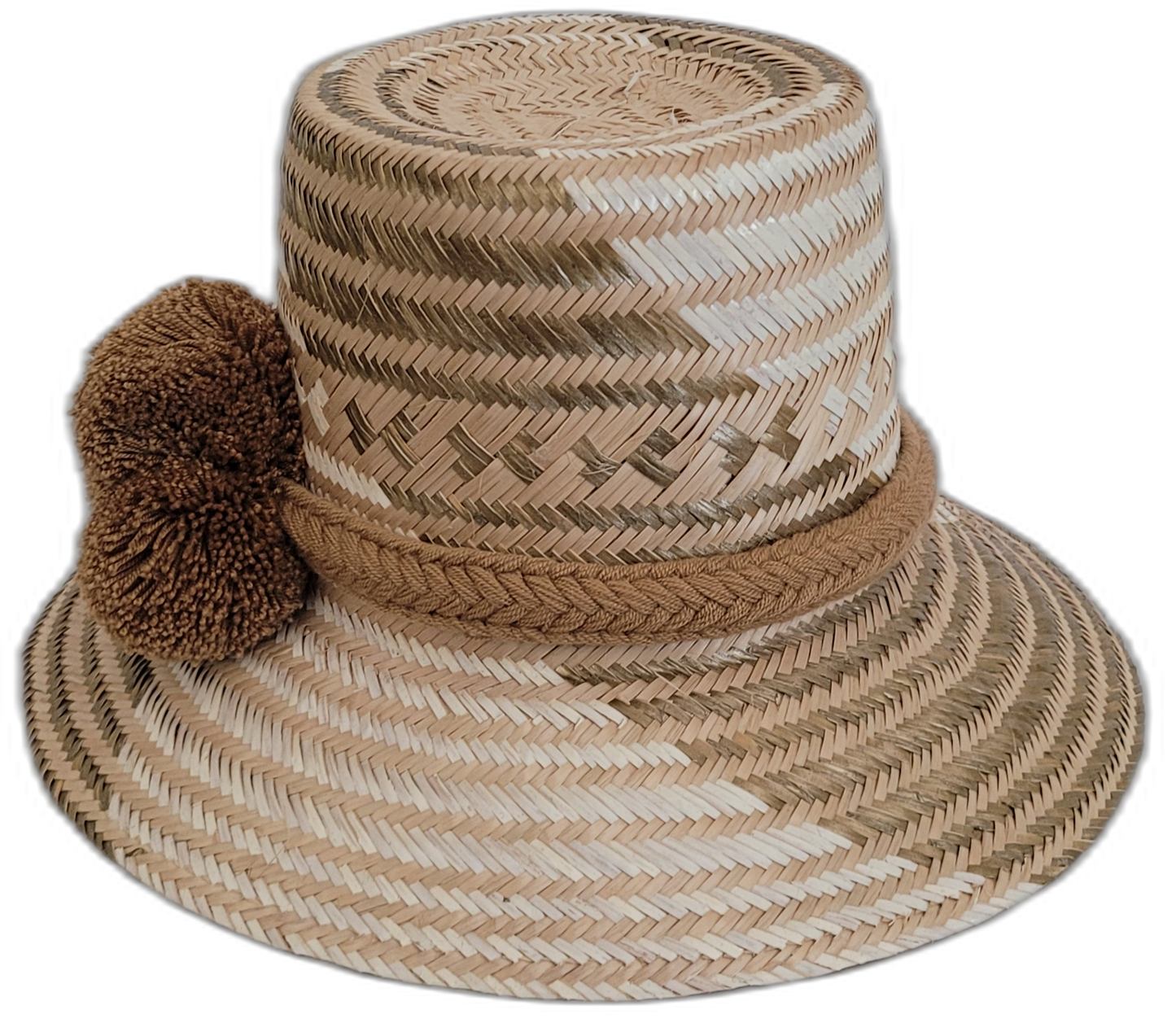 Artisan-crafted Wayuu hat featuring beige straw and brown pompoms.

