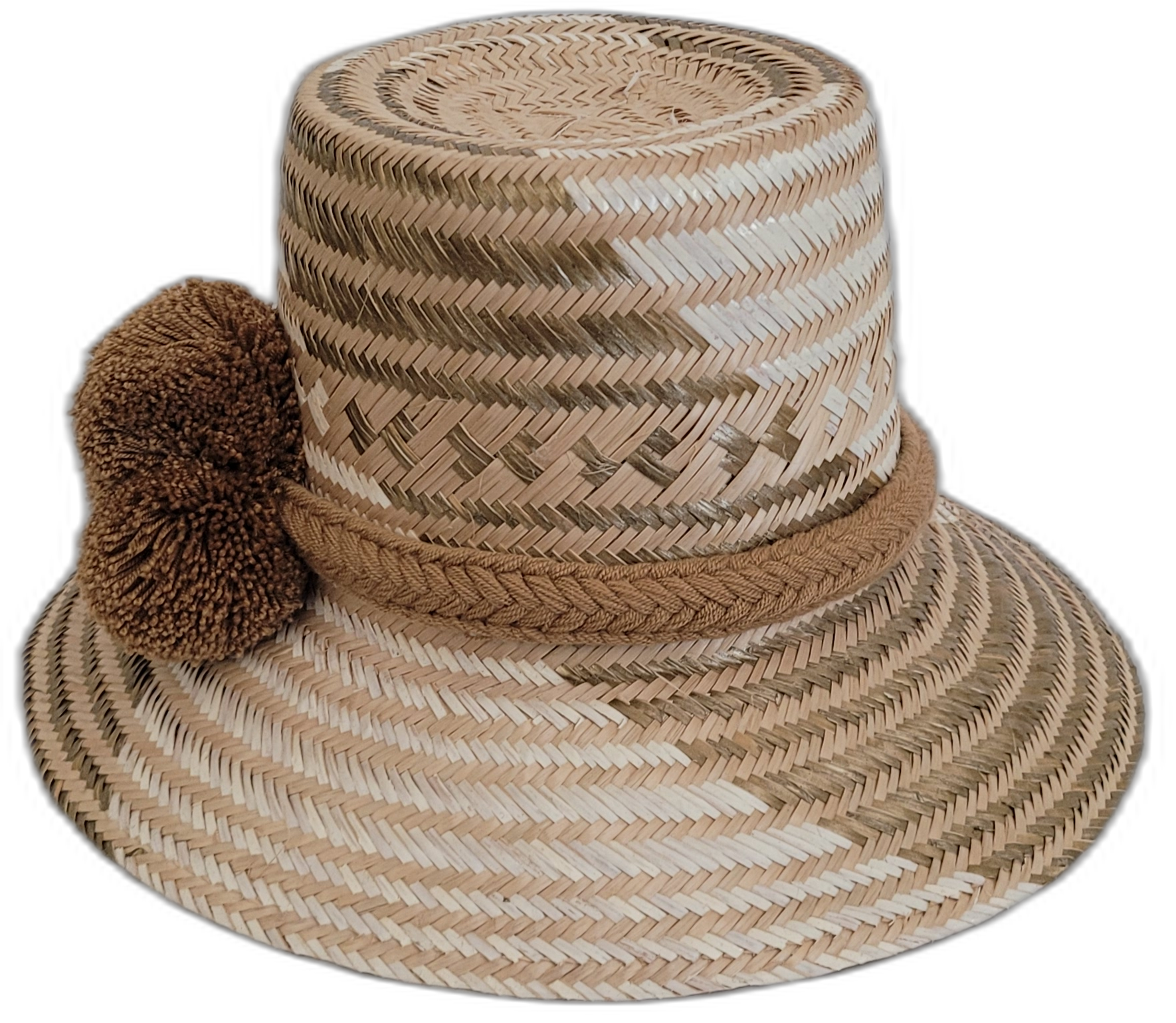 Artisan-crafted Wayuu hat featuring beige straw and brown pompoms.

