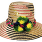 "Artisan-crafted Wayuu hat woven from Iraca palm fibers, adjustable, with vibrant pompoms symbolizing prosperity."