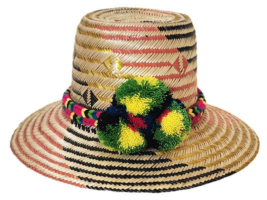 "Artisan-crafted Wayuu hat woven from Iraca palm fibers, adjustable, with vibrant pompoms symbolizing prosperity."