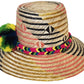 "Artisan-crafted Wayuu hat woven from Iraca palm fibers, adjustable, with vibrant pompoms symbolizing prosperity."