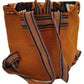 Bohemian Wayuu bag in orange, black, cream, and green with artisan details.