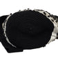 Artisan Wayuu bag in black and white, featuring bold beading and texture.