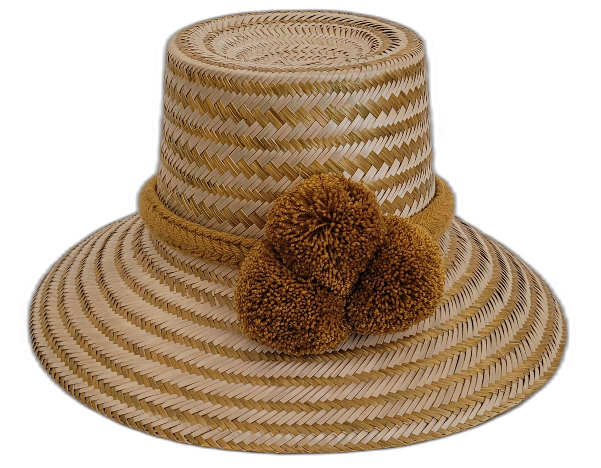Handcrafted Wayuu natural straw hat with olive-ochre pompoms.

