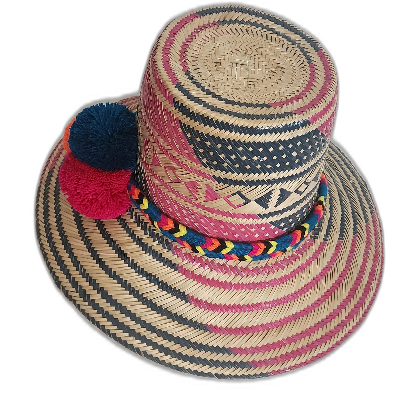Artisan-crafted hat with multicolor pompom cluster and geometric navy-pink weave.