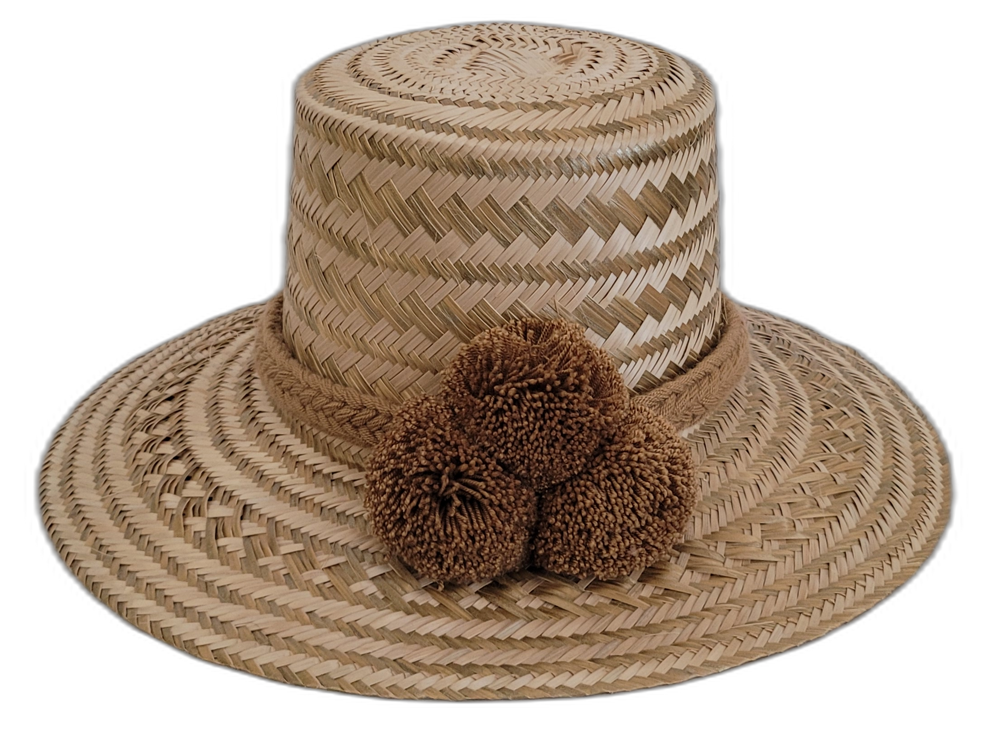 Natural Wayuu hat with fine zigzag weave and brown pompoms.

