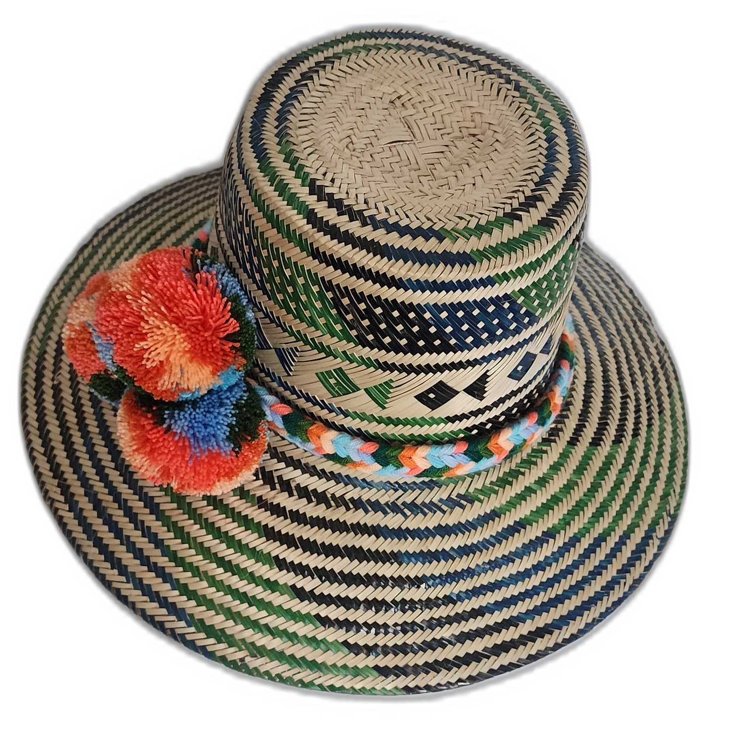 Colorful handcrafted Wayuu straw hat with bright orange and blue pompoms.