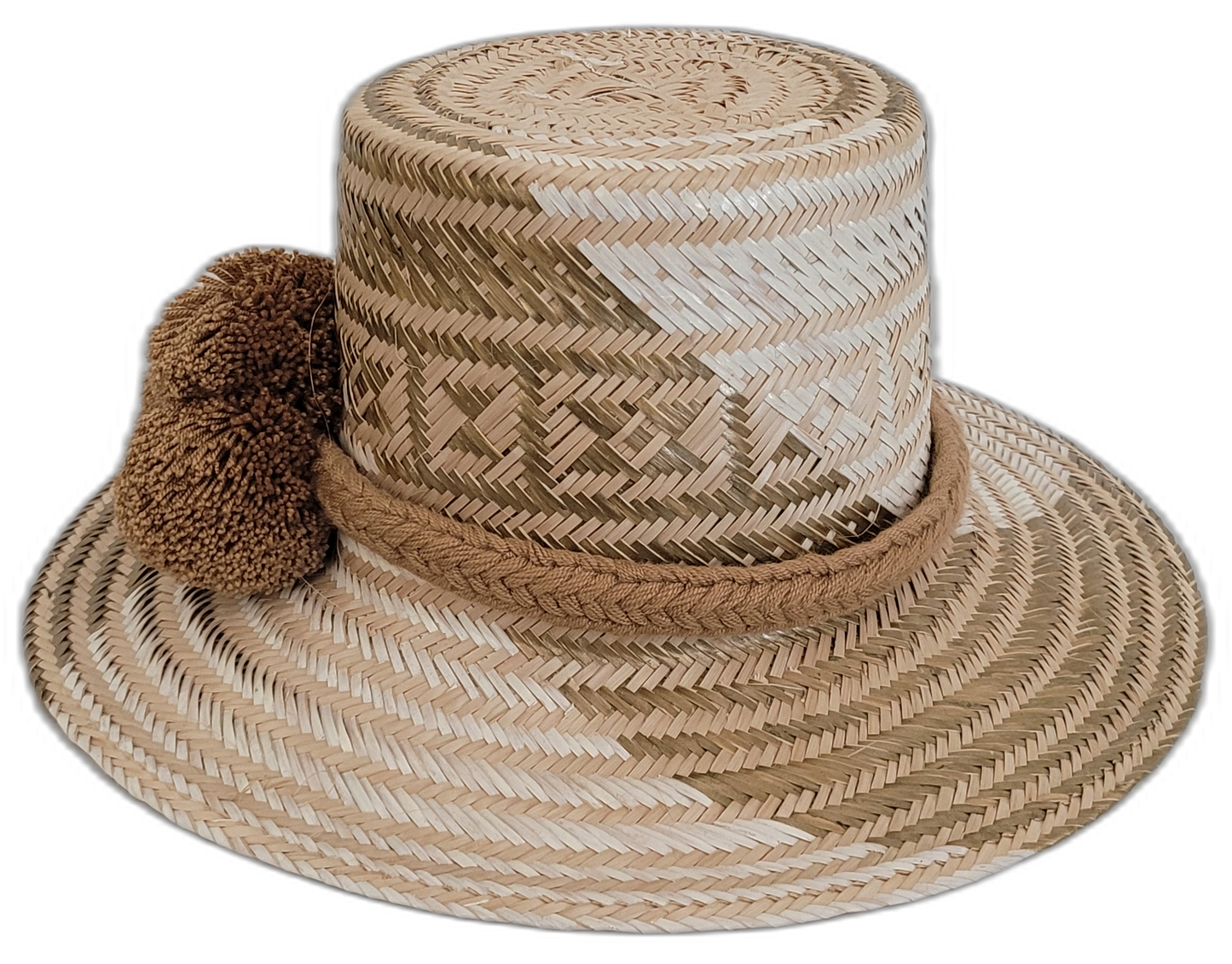Boho Wayuu hat crafted with earth-tone weave and adorned with brown pompoms.

