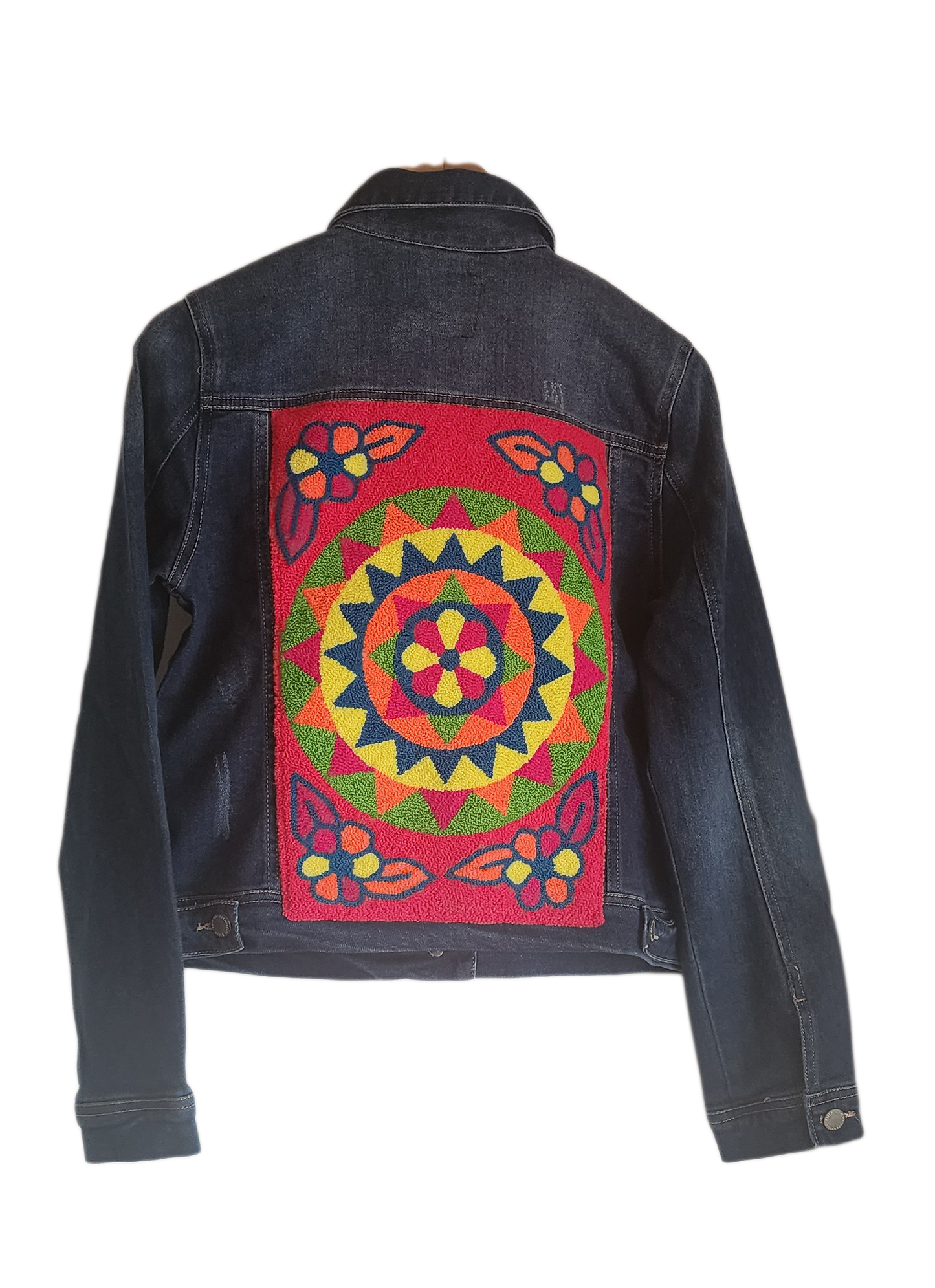 "Artisan-made denim jacket with colorful punch needle embroidery on the back, showcasing unique, vibrant designs."