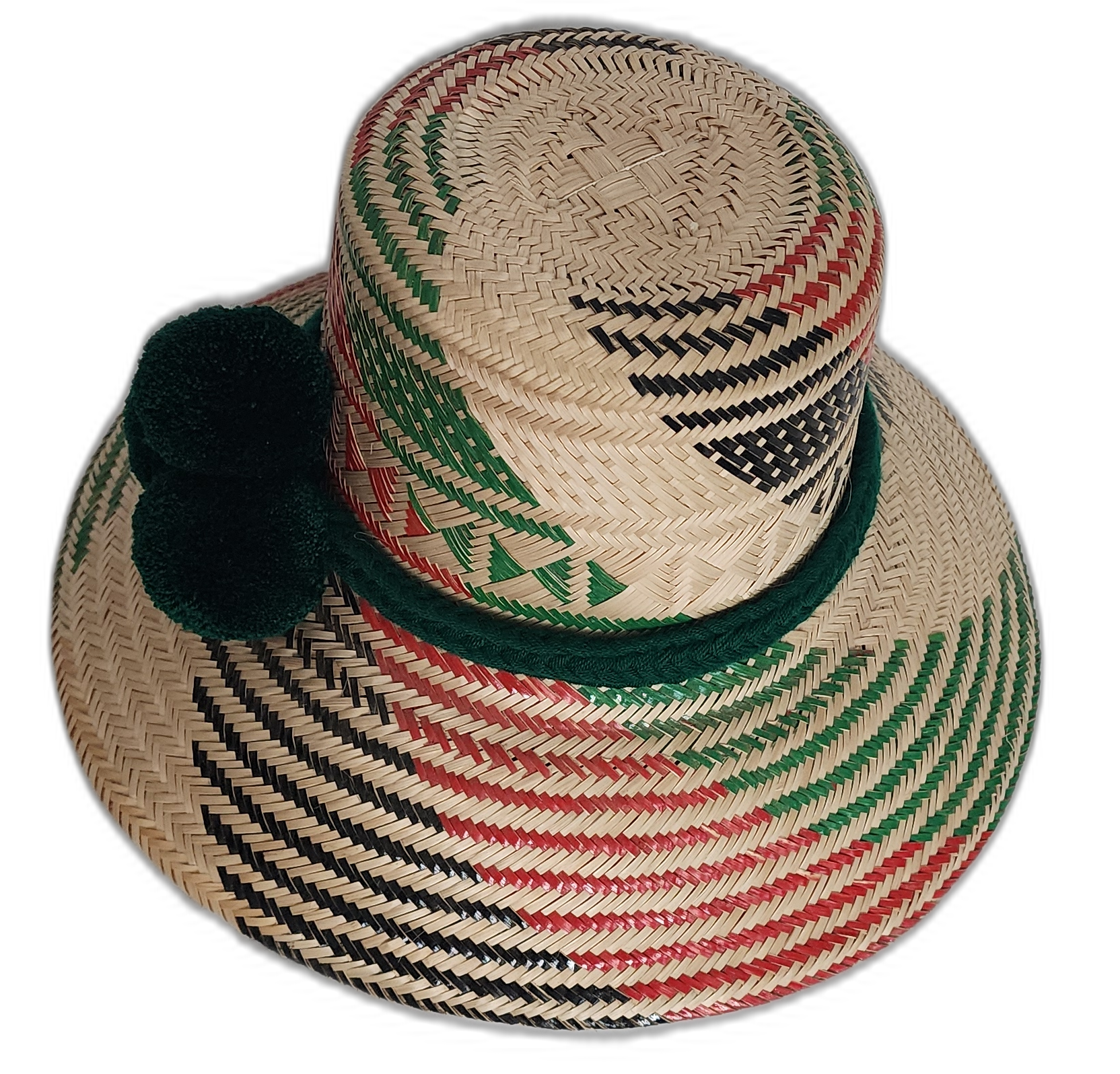 Artisan Wayuu hat with bold red and green accents and forest green pompoms