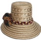 Natural color Wayuu hat with tribal designs and gold-brown pompoms