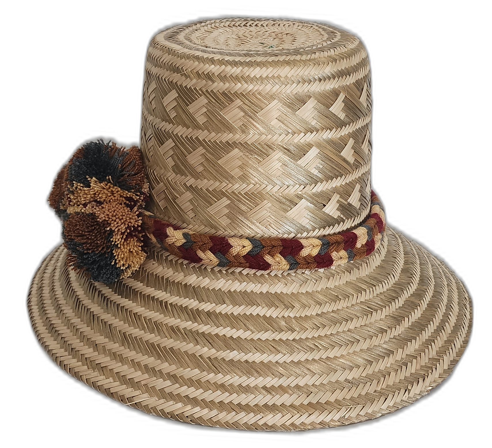 Natural color Wayuu hat with tribal designs and gold-brown pompoms