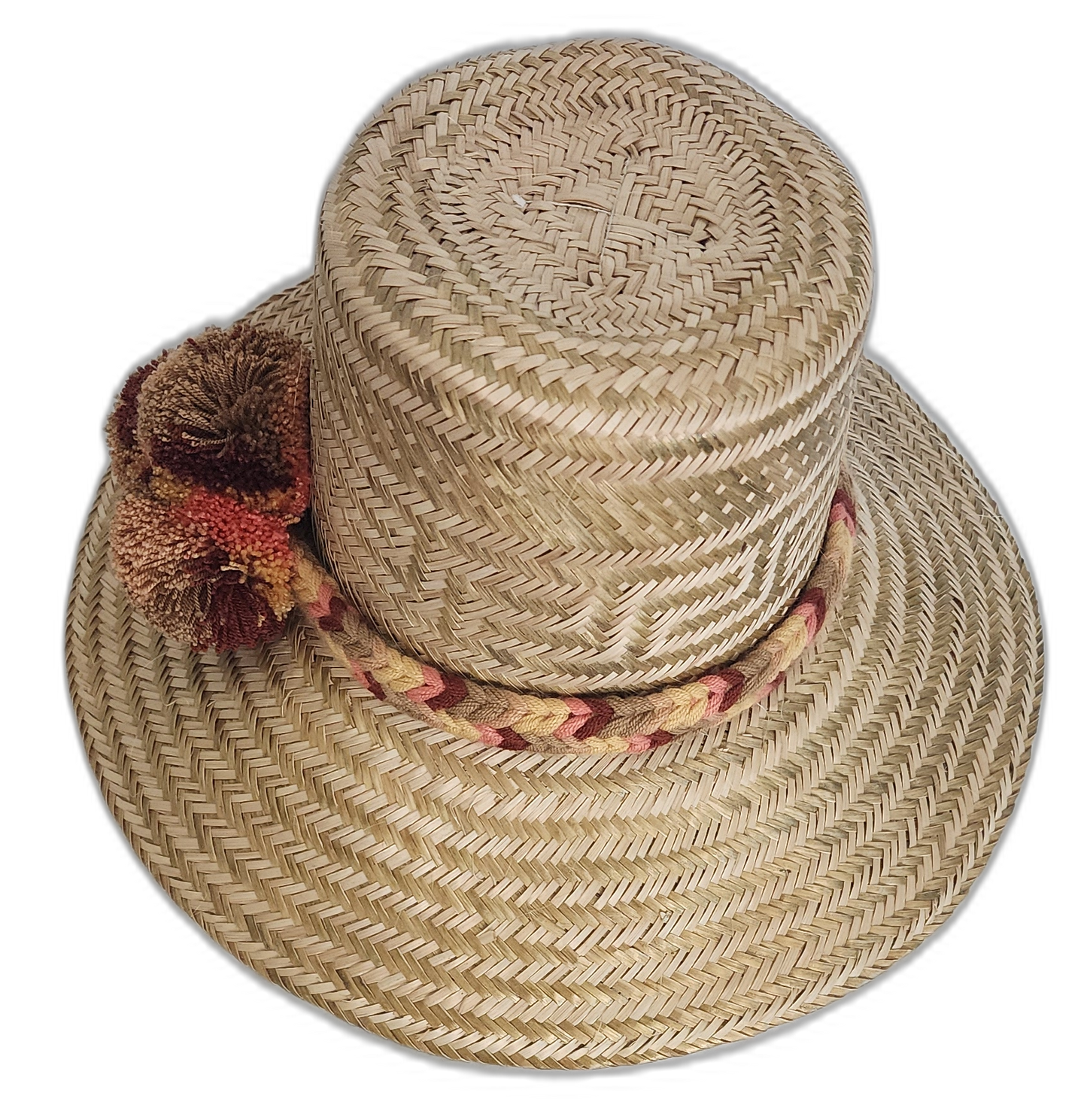 Natural palm straw hat featuring red, brown, and gold pompoms