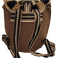 Bohemian Wayuu backpack in beige and black with handmade tassel ties.